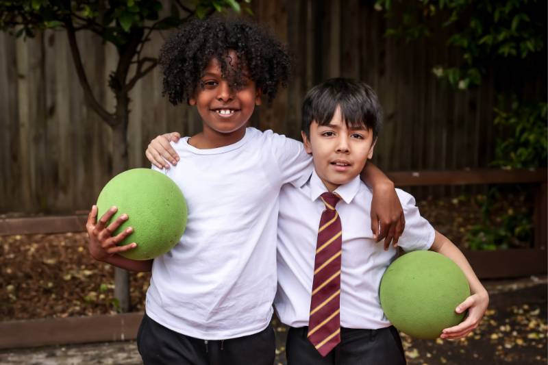 Boy, girl and balls